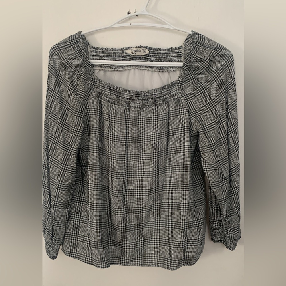 Plaid grey, black and white off-the-shoulder top